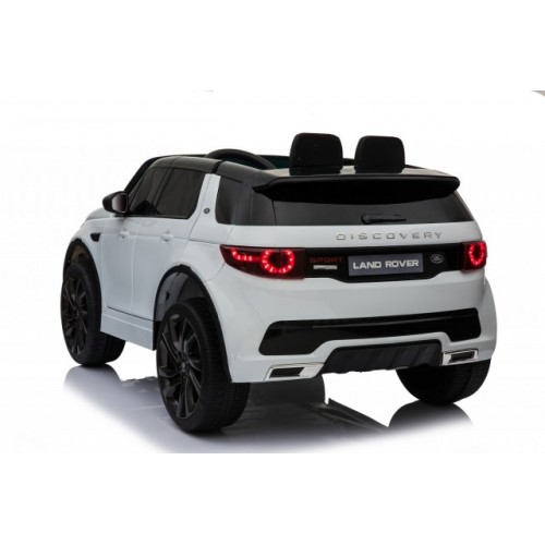 Auto na akumulato Land Rover Discovery sa kožnim sedištem i mekim gumama - Beli