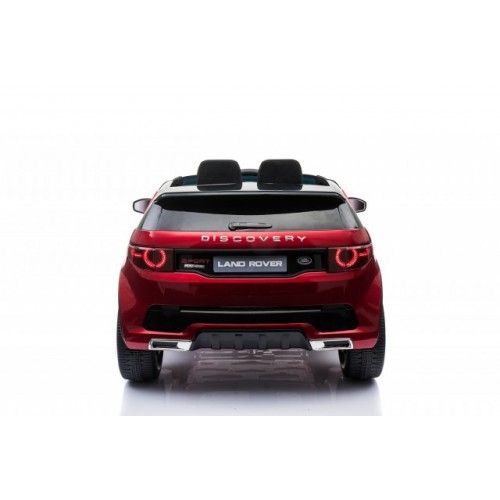 Auto na akumulato Land Rover Discovery sa kožnim sedištem i mekim gumama Crveni