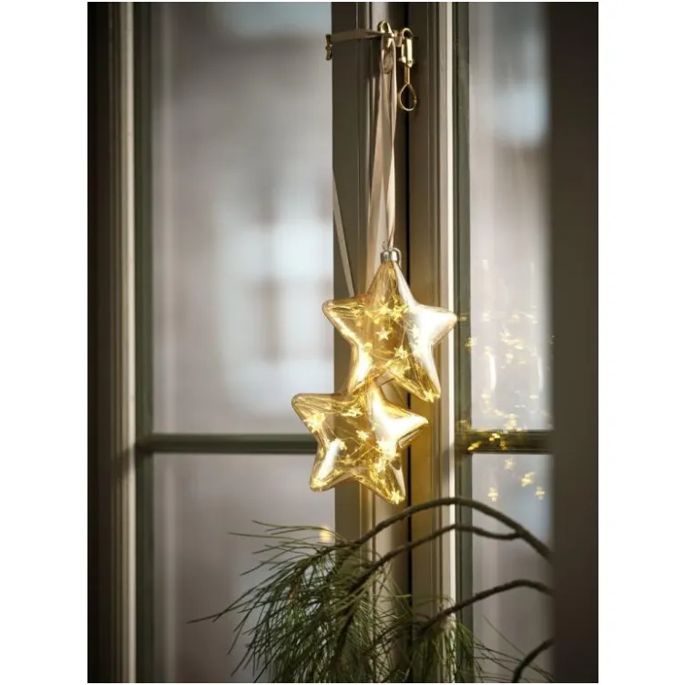 Dekorativna novogodišnja zvezda sa LED osvetljenjem unosi topao praznični sjaj u dom.