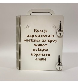 Kutija knjiga sa natpisom Kum je dar od Boga