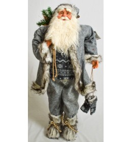Sivi deda Mraz sa Rukavicama Na Kanapu i Džakom